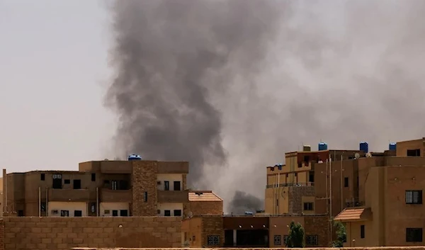 Smoke comes out of a building in Khartoum following clashes between rival generals   (Reuters)