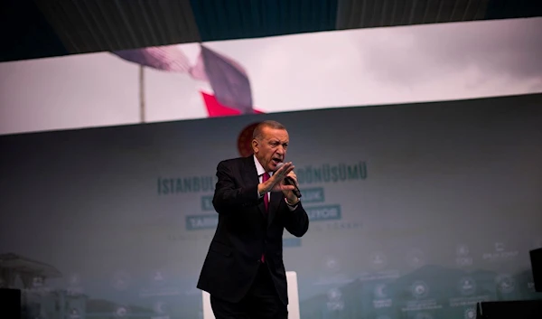 Turkish President and People's Alliance's presidential candidate Recep Tayyip Erdogan gives a speech during an election rally campaign in Istanbul, Turkey, Friday, April 21, 2023 (AP Photo/Francisco Seco)