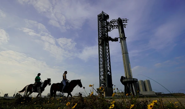 NASA astronaut Sunita Williams, left, and Haley Esparza, ride horseback as they visit SpaceX's Starship as it is readied for launch at Starbase in Boca Chica, Texas, Wednesday, April 19, 2023. (AP)