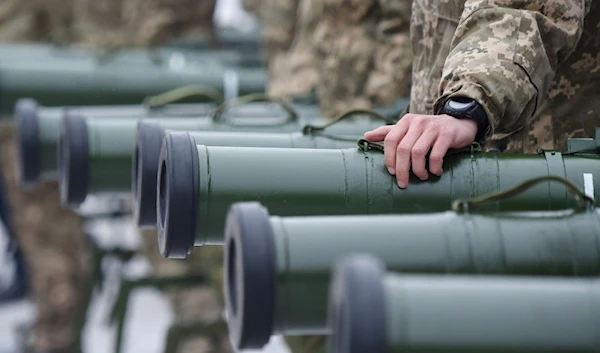 Ukrainian servicemen taking part in the armed conflict with Russia-backed separatists in Donetsk region of the country attend the handover ceremony of military heavy weapons and equipment in Kiev on November 15, 2018. (AFP)