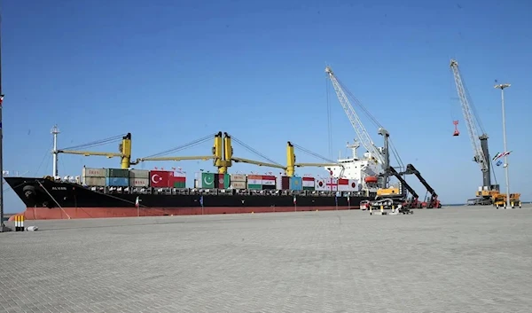 A container ship 'Avalan' docked at the Chabahan port in Iran bears the ship of various Iran trade partners. (AFP)