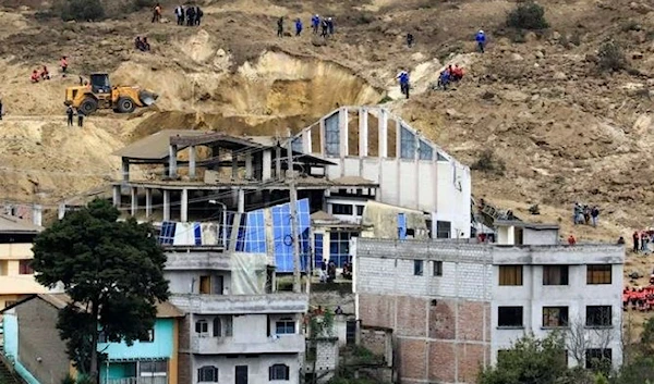 View of the site of a landslide triggered by heavy rains, during rescue operations, in Alausi, Ecuador March 28, 2023. (Reuters)