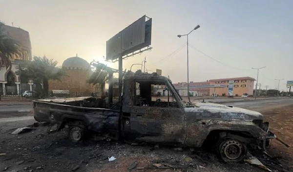 A burned vehicle is seen in Khartoum, Sudan April 26, 2023. (Reuters)