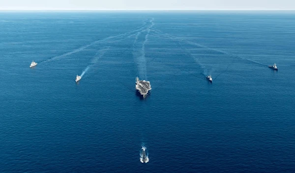 Japanese, South Korean and U.S. Naval Vessels take part in joint anti-submarine exercises off South Korea's coast, in this handout photo provided by South Korean Navy and relased by Yonhap on September 30, 2022 (Reuters).