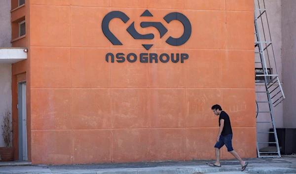 A logo adorns a wall on a branch of the Israeli tech company NSO Group, near the southern Israeli town of Sapir, Aug. 24, 2021. (AP)