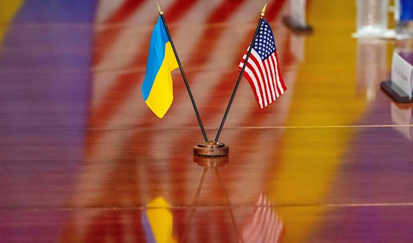 The Ukrainian and United States flags are placed on the table during a meeting with Secretary of Defense Lloyd Austin and Ukrainian Prime Minister Denys Shmyhal at the Pentagon, Wednesday, April 12, 2023, in Washington. (AP)