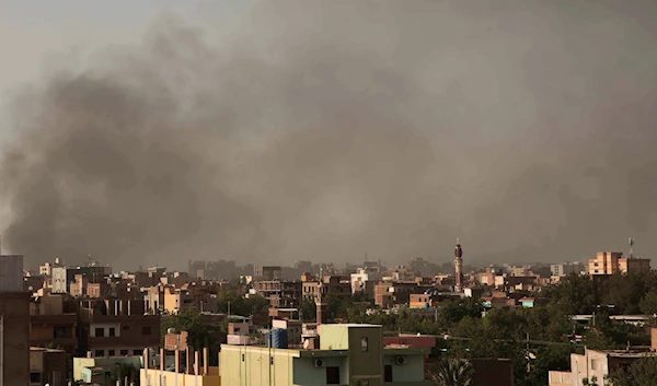 Smoke rises in Khartoum, Sudan, Saturday, April 29, 2023, as gunfire and heavy artillery fire continued despite the extension of a cease-fire between the country's two top generals. (AP)