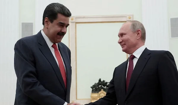 Russian President Vladimir Putin shakes hands with Venezuelan President Nicolas Maduro during a meeting at the Kremlin in Moscow, Russia September 25, 2019 (Reuters)