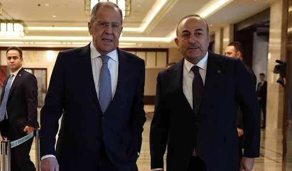 Russian Foreign Minister Sergey Lavrov and Minister Mevlut Cavusoglu pictured together before a meeting in Ankara, Turkey, 7 April 2023. (AFP)