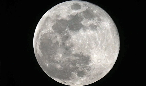 The full moon, also known as Supermoon or Flower Moon, is pictured in Cairo, Egypt, May 7. (Reuters)