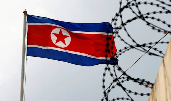 North Korea flag flutters next to concertina wire at the North Korean embassy in Kuala, Malaysia, March 9 2017 (Reuters)