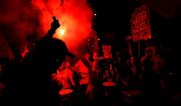 Israelis protest plans by Prime Minister Benjamin Netanyahu's government to overhaul the judicial system, in Tel Aviv, Israel, Saturday, April 1, 2023. (AP)