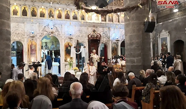 Patriarch Youssef Al-Absi presided over a religious mass  celebrating Easter in the Melkite Greek Catholic Patriarchal Cathedral of the Dormition of Our Lady in Al Zeitoun, Damascus, Syria, 9 April 2023. (SANA).