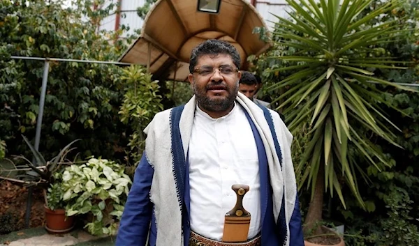 Mohammad Ali Al-Houthi, member of the Supreme Political Council in Yemen, walks after an interview in Sanaa, Yemen, 1 August 2018.(Reuters)