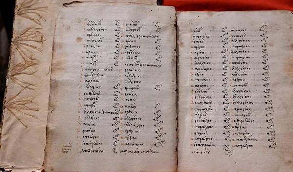 The manuscript’s pages list monks and benefactors to the monastery who were to be included in prayers by a priest.