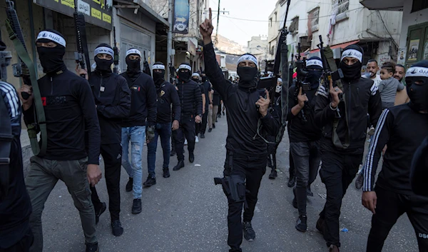 Palestinian Resistance Brigade in a military parade, in the West Bank refugee camp of Balata, near Nablus, Friday, Nov. 4, 2022. (AP)