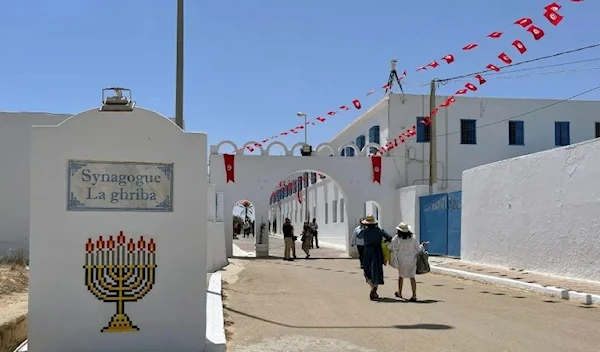 Visitors arrive at Ghriba synagogue in Djerba, Tunisia, in 2022 (Reuters)