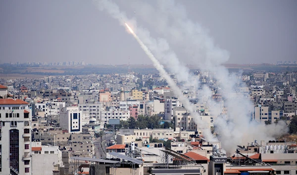 Rockets are launched from the Gaza Strip towards the occupied Palestinian territories, in Gaza, May 10, 2023 (AP)