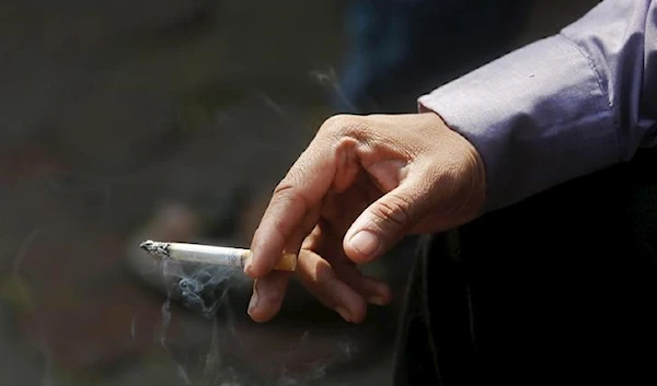 A man holding a cigarette in Mumbai, India on January 6, 2016 (Reuters)