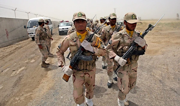 A group of Iranian border guards march at the eastern border of Iran shared with Pakistan and Afghanistan near Zabol, Sistan and Baluchistan Province, Iran, on July 19, 2011. (AP)