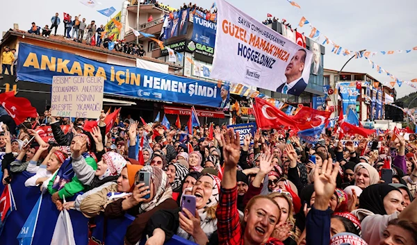 Supporters of Turkish President Tayyip Erdogan attend a rally ahead of the May 14 presidential and parliamentary elections in Ankara, Turkey, May 11, 2023 (Reuters)