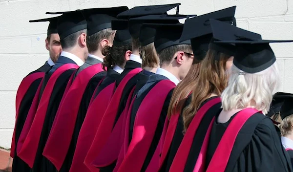 FILE PHOTO: Warwick University graduates on the day of their graduation ceremony in Warwick, Britain on July 17, 2017 (Reuters)