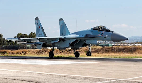 This Sept. 26, 2019 file photo, shows a Russian Su-35 fighter jet taking off at Hemeimeem air base in Syria (AP Photo/Alexander Zemlianichenko, File)