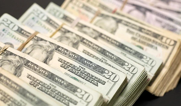 Bundles of banknotes of U.S. Dollar are pictured at a currency exchange shop in Ciudad Juarez, Mexico on January 15, 2018 (Reuters)