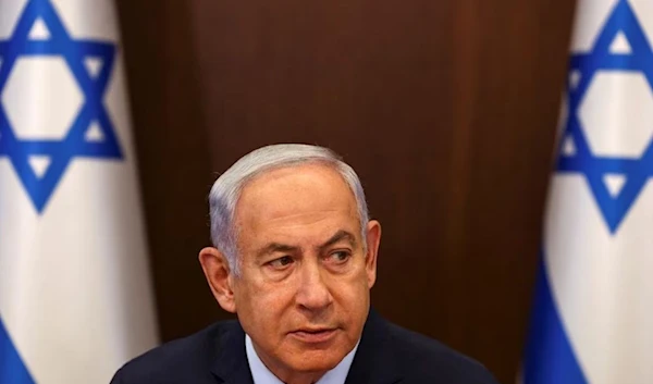 Israeli Prime Minister Benjamin Netanyahu looks on as he convenes a cabinet meeting at the Prime Minister's office in Jerusalem, May 7, 2023.