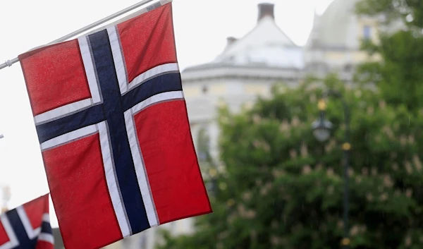 Norwegian flags flutter at Karl Johans street in Oslo, Norway, on May 31, 2017 (Reuters)