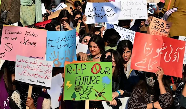 Women take part in protest march in Lahore, Pakistan, on International Women’s Day despite ban on demonstrations. (AFP)