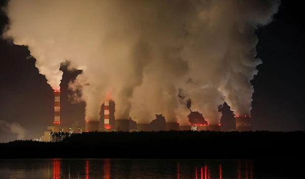 Smoke and steam billows from Belchatow Power Station, Europe's largest coal-fired power plant operated by PGE Group, at night near Belchatow, Poland December 5, 2018. (Reuters)