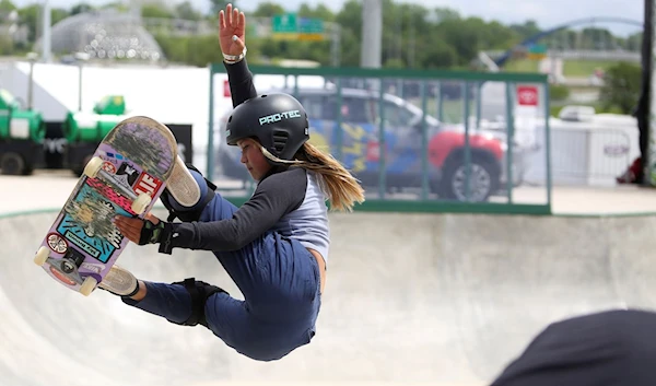 Skateboarder Sky Brown (UK) practices during a stop on the Dew Tour, which showcases athletes before skateboarding makes its Olympic debut in Tokyo, at Lauridsen Park in Des Moines, Iowa, U.S., May 19, 2021. (Reuters )