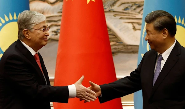 Chinese President Xi Jinping and Kazakhstan's President Kassym-Jomart Tokayev shake hands during a signing ceremony, ahead of the China-Central Asia Summit in Xian, Shaanxi province, China May 17, 2023. (Reuters)