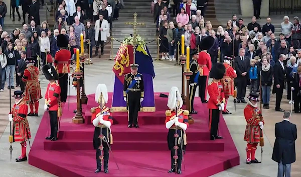 Queen Elizabeth II lies in state at the Palace of Westminster. (AP)