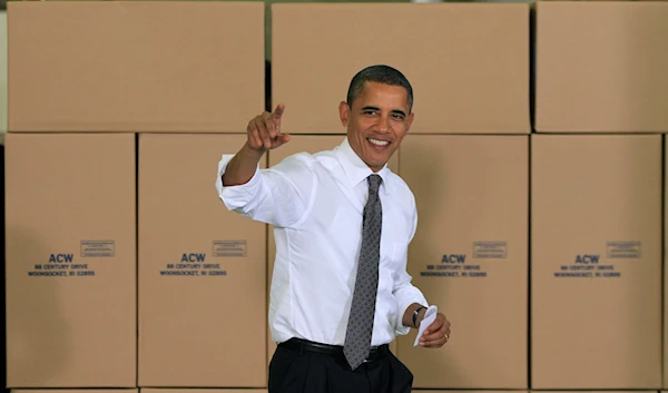 President Barack Obama waves during a visit to the American Cord & Webbing Co. in Woonsocket, R.I., Monday, Oct. 25, 2010. (AP Photo/Charles Krupa)