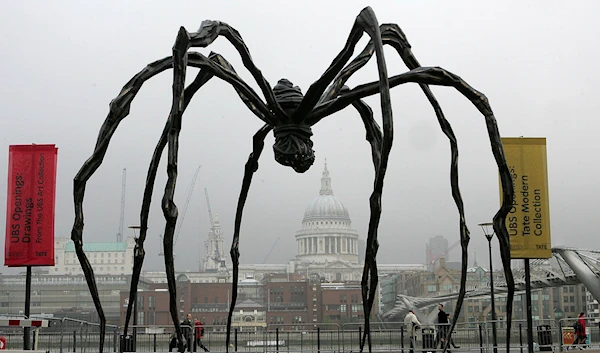 In this Oct. 3, 2007 file photo, French-born artist Louise Bourgeois' sculpture of a giant spider, Maman 1999, stands outside the Tate Modern in London. (AP)