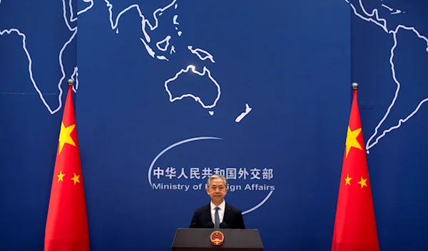 Chinese Foreign Ministry spokesperson Wang Wenbin speaks during a regular press conference in Beijing, Tuesday, May 9, 2023. (AP)