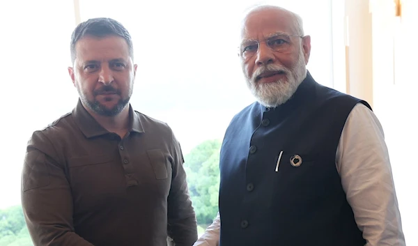 Indian PM Narendra Modi shaking hands with Ukrainian President Volodymyr Zelensky at the G7 summit in Hiroshima, May 20 2023 (social media)