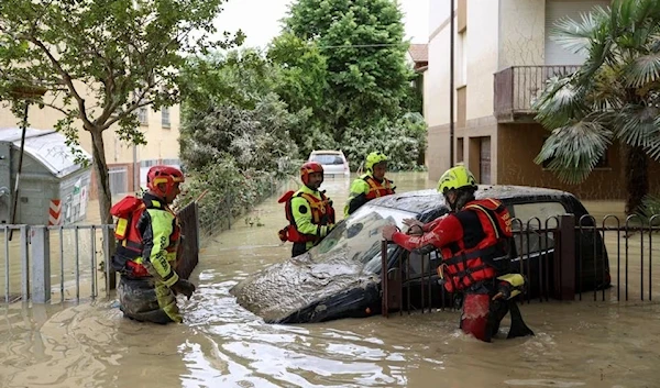 Firefighters complete their rescue missions and work in the flood hit region of Emilian Romagna, Italy, 18 May 2023. (Reuters)