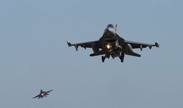 U.S. Air Force F-16 fighter jets fly over the Osan U.S. Air Base during a combined air force exercise with the United States and South Korea in Pyeongtaek, South Korea, Dec. 4, 2017 (AP Photo/Ahn Young-joon, File)