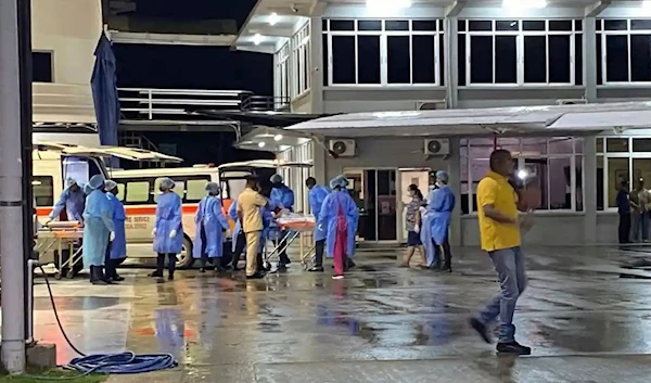 Medical personnel in Georgetown receive patients after the school fire in Guyana. (AFP)