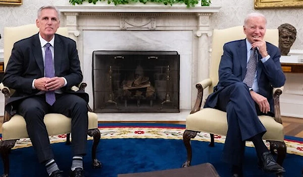 US President Joe Biden meets with US House Speaker Kevin McCarthy (R-CA) (L) about the debt ceiling, in the Oval Office of the White House in Washington, DC, on May 22, 2023. (AFP)