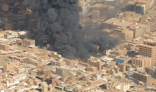 Black smoke builds up at Omdurman market in Omdurman, Sudan, 15 May 2023. (Reuters)