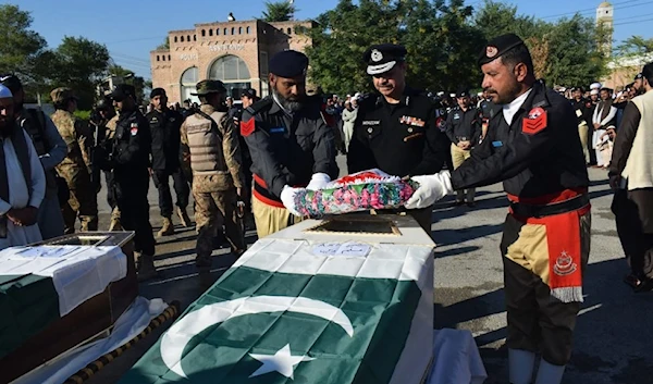 Security personnel examine the site of a blast after a suicide bomber on a motorbike blew himself up near a checkpoint in the southwestern city of Quetta, Sept. 5, 2021. (AFP)