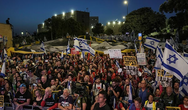 Israelis protest against a budget proposed by Prime Minister Benjamin Netanyahu's government ahead of a parliamentary vote and its plans to overhaul the country's judicial system in Jerusalem, Tuesday, May 23, 2023. (AP)