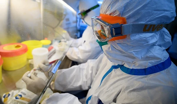 Chinese scientists in a laboratory in Beijing, China (Reuters)