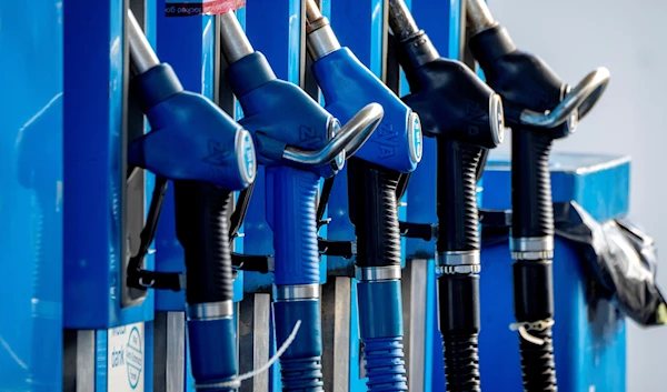 Taps are photographed at a gas station in Frankfurt, Germany, on October 5, 2022 (AP)