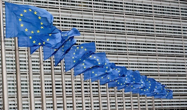 European Union flags flutter outside the EU Commission headquarters in Brussels, Belgium, July 14, 2021. (Reuters)