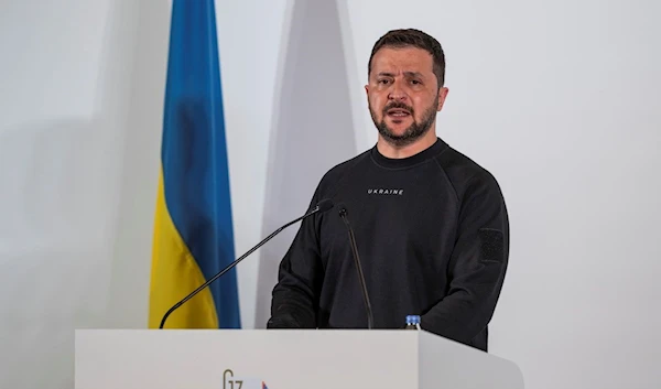 Ukrainian President Volodymyr Zelenskyy speaks during a news conference at the Group of Seven nations' summit in Hiroshima, western Japan, Sunday, May 21, 2023 (AP Photo/Louise Delmotte, Pool)